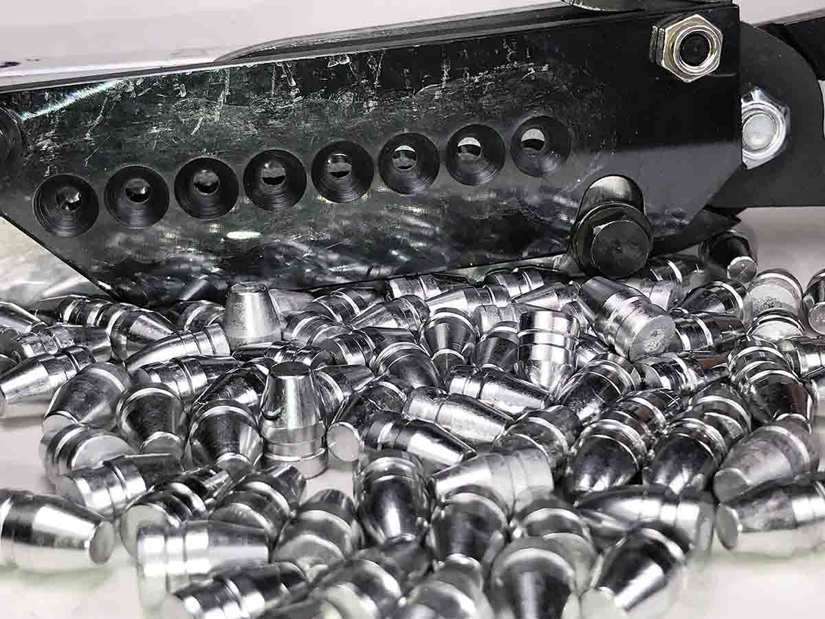 Eight-cavity MP 359-125 moulds require the correct timing of casting and opening the mould to produce bullets with evenly cut bases while not leaving smears of lead on the bottom of the sprue plate.